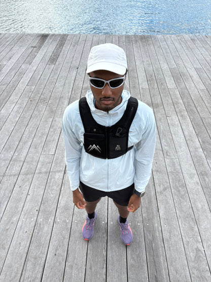 Bounce Free Storage for Your Phone, Hydration & Fuel - CarryLite Running Vest